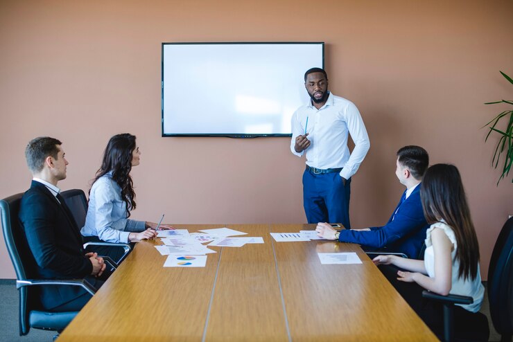 business meeting with chalkboard